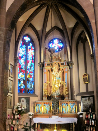 left side altar with statue of Mary
