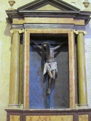 crucified Christ with long hair