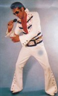 Phil Dexter as Elvis Presley
